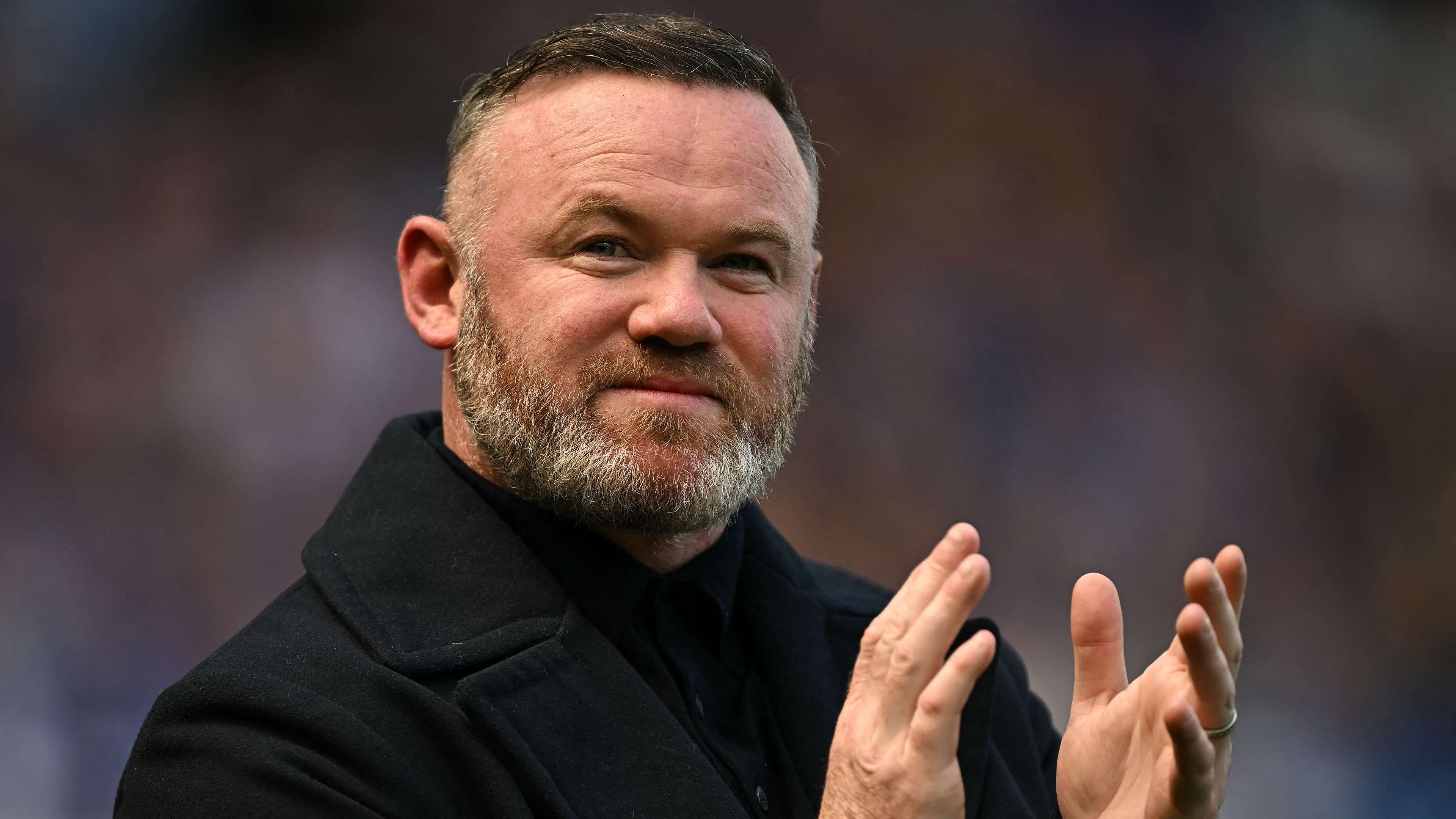 Rooney slams critics who claim he is 'uneducated'  
