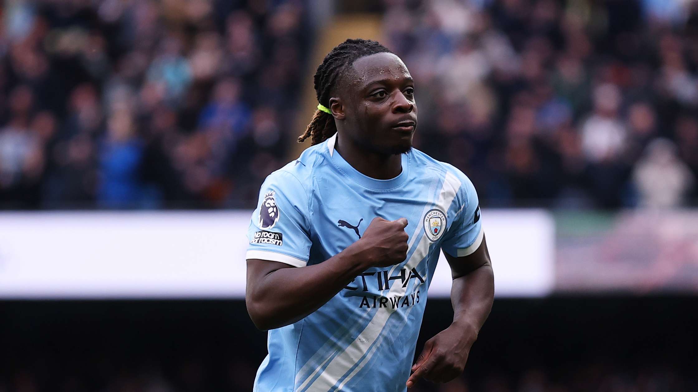 Doku signs new five-year Man City deal  